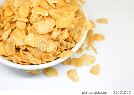 图库照片: cornflake cereals in a white bowl. easy breakfast