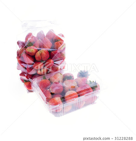 图库照片: strawberry juicy fruit in plastic bag packaging