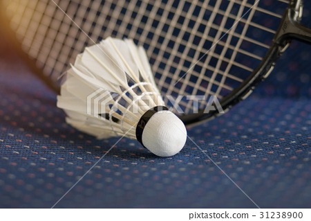 图库照片: badminton ball, shuttlecock racket on court floor