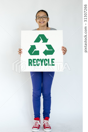 图库照片: young woman holding recycle sign environment