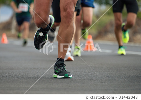 图库照片: marathon running race, people feet on city road