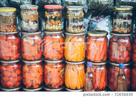 图库照片: jars with pickled vegetables. preserved food