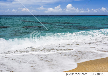 图库照片: sea wave with sand beach