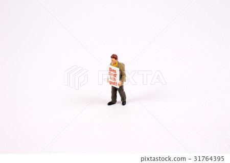 图库照片: figure of sandwichman sell notices