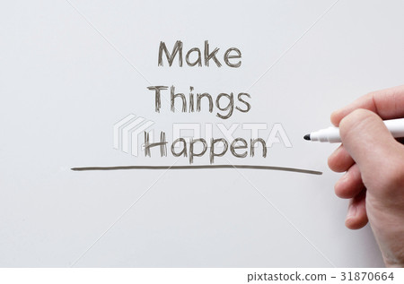 图库照片: make things happen written on whiteboard