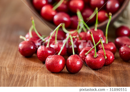 图库照片: close up of fresh cherry berries with water drops.