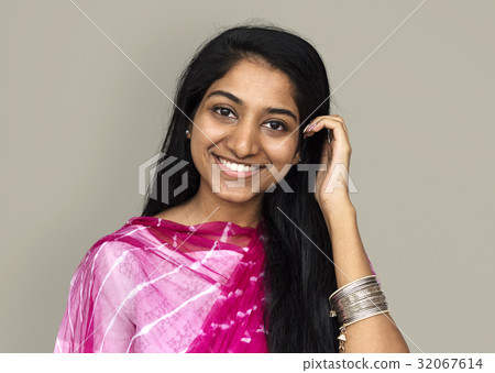 图库照片: indian girl smiling casual studio portrait