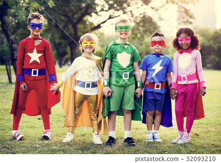 图库照片: kids wear superhero costume outdoors