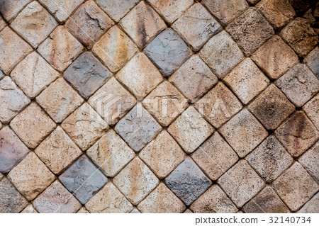 图库照片: stone square brick block wall for texture