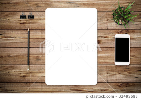 图库照片: top view of blank paper page on wood background offi