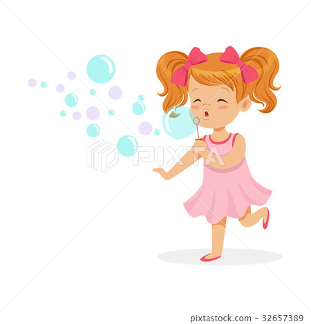 图库插图: happy redhead girl in pink dress blowing bubbles