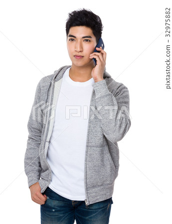 stock photo: young man talk to cellphone