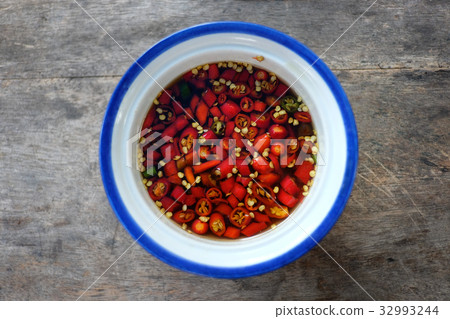 图库照片: bowl of red hot chili in fish sauce