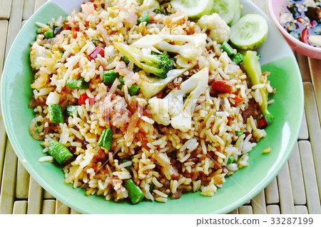 照片素材(图片): fried rice with sour pork and vegetable on dish