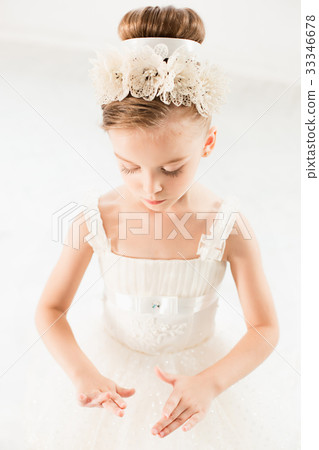图库照片: little ballerina girl in a tutu. adorable child