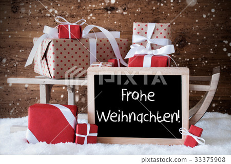 图库照片: sleigh, frohe weihnachten means merry christmas