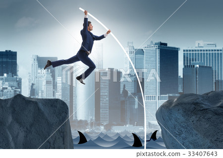 图库照片: businessman in pole vaulting concept