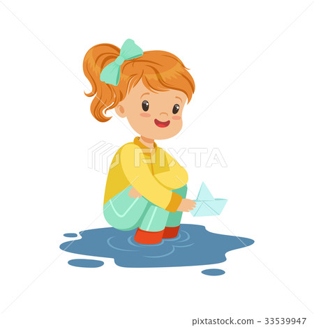 插图素材: sweet little girl playing with paper boat in a