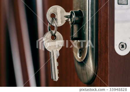 图库照片: keys in the door lock. object photo.