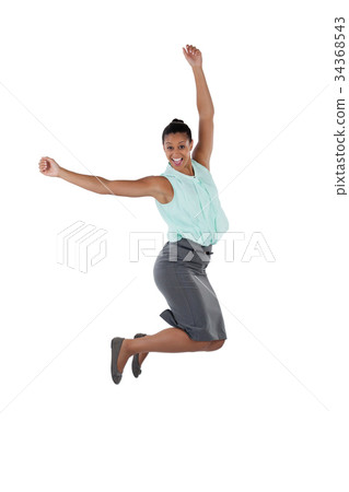 图库照片: excited businesswoman jumping in the air