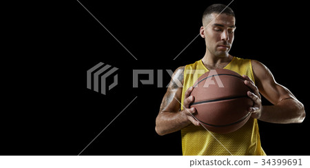 basketball player图片,basketball图片 图库照片: basketball player on a black background