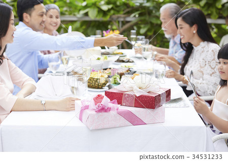 family party,home party two colorful presents are on the table of a family party in a