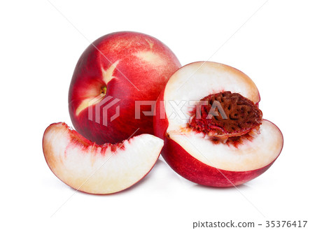 图库照片: whole and half with slice of nectarine peach fruit