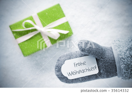 gift, glove,frohe weihnachten mean merry christmas 35614332