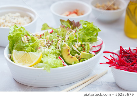 图库照片: green vegetable salad with sprouts