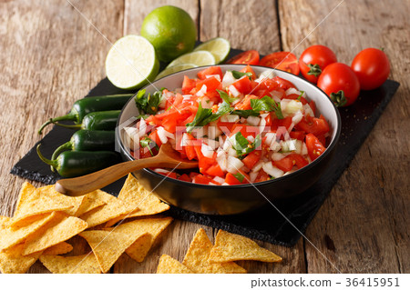 图库照片: mexican pico de gallo with ingredients closeup