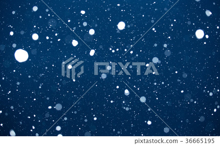 图库照片: falling snow on blue background.