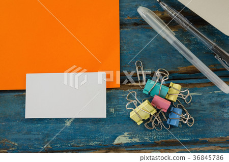 图库照片: book, paper clip, visiting cards and blank paper on