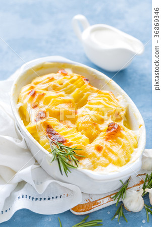 图库照片 baked potato gratin