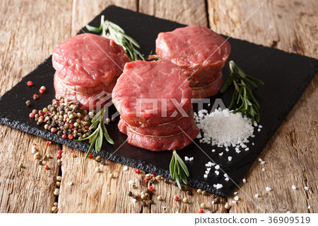 图库照片 fresh raw beef fillet mignon on old wooden