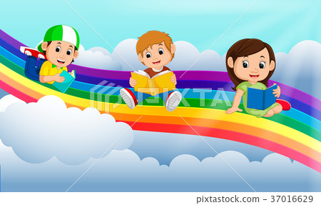 图库插图: happy children reading book over the rainbow