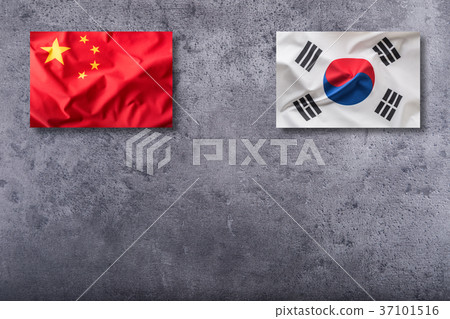 图库照片: china and south korea flag on concrete background