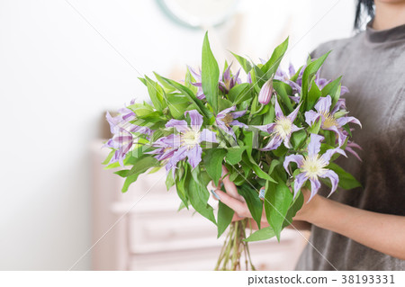 图库照片 beautiful luxury bouquet of lilac clematis flowers