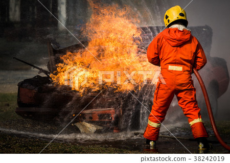 图库照片: fire fighters team training