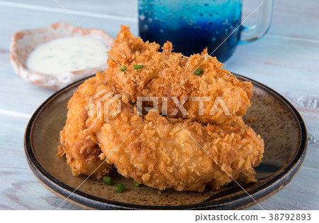 图库照片: crispy chicken tenderloid deep fried.