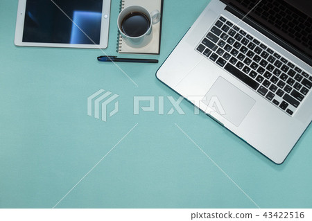 keyboard with notebook. laptop with coffee and pad.