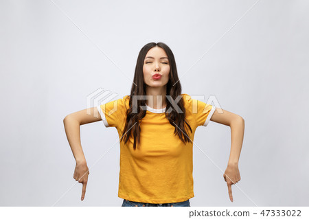 stock photo: portrait of happy young asian woman with finger