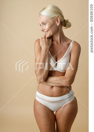 Beautiful Mature Woman In Underwear With Fit Stock Photo