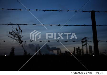 Barbed wire and factory 39306