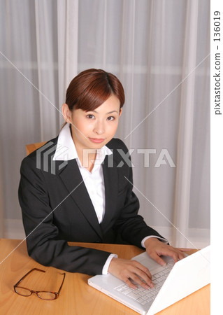 Working on a computer Working on a computer 136019