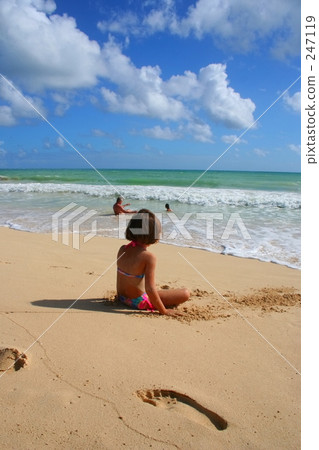 A girl staring at the sea A girl staring at the sea 247119