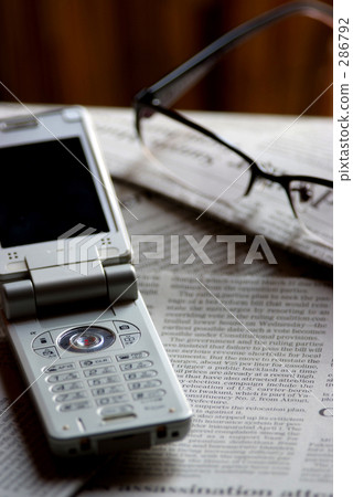 Glasses and cell phone Glasses and cell phone 286792