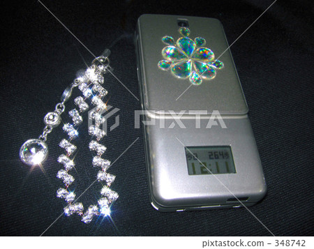 Cell phone and strap Cell phone and strap 348742