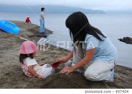 Children playing sand Children playing sand 407404