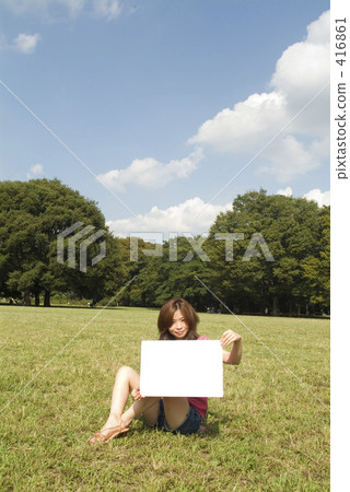 A woman with a white message board 01 A woman with a white message board 01 416861