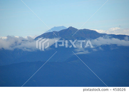 The peak of Mt. Fuji that makes the face peep at Sho Mitake's shoulder The peak of Mt. Fuji that makes the face peep at Sho Mitake's shoulder 458026